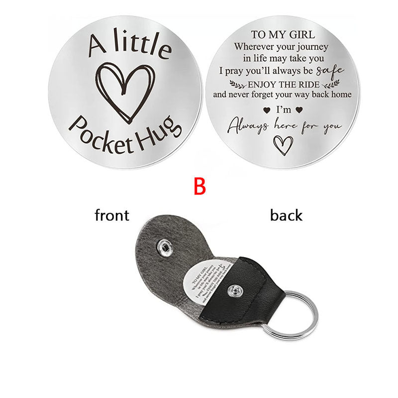A small pocket Hug engraved key chain round stainless steel metal accessories