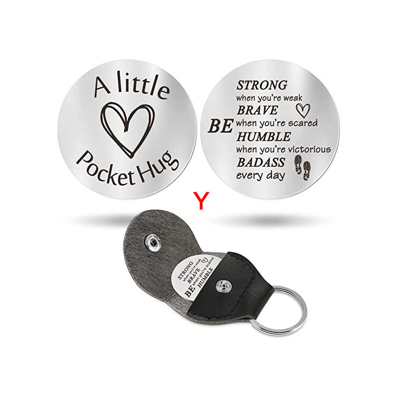 A small pocket Hug engraved key chain round stainless steel metal accessories